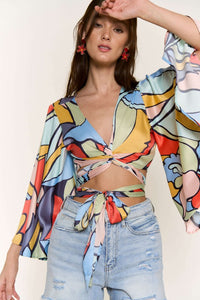 PRINTED SATIN WRAP TOP WITH BELL SLV