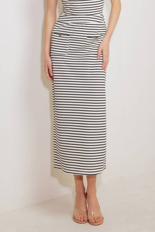 A striped woven skirt featuring front pocket, elasticized back waist and back slit