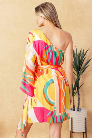 A printed woven kaftan mini dress featuring one shoulder neckline and self sash tie