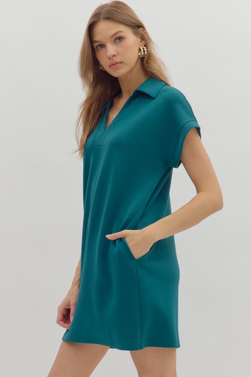 Solid spread collar V-neck pullover mini dress.