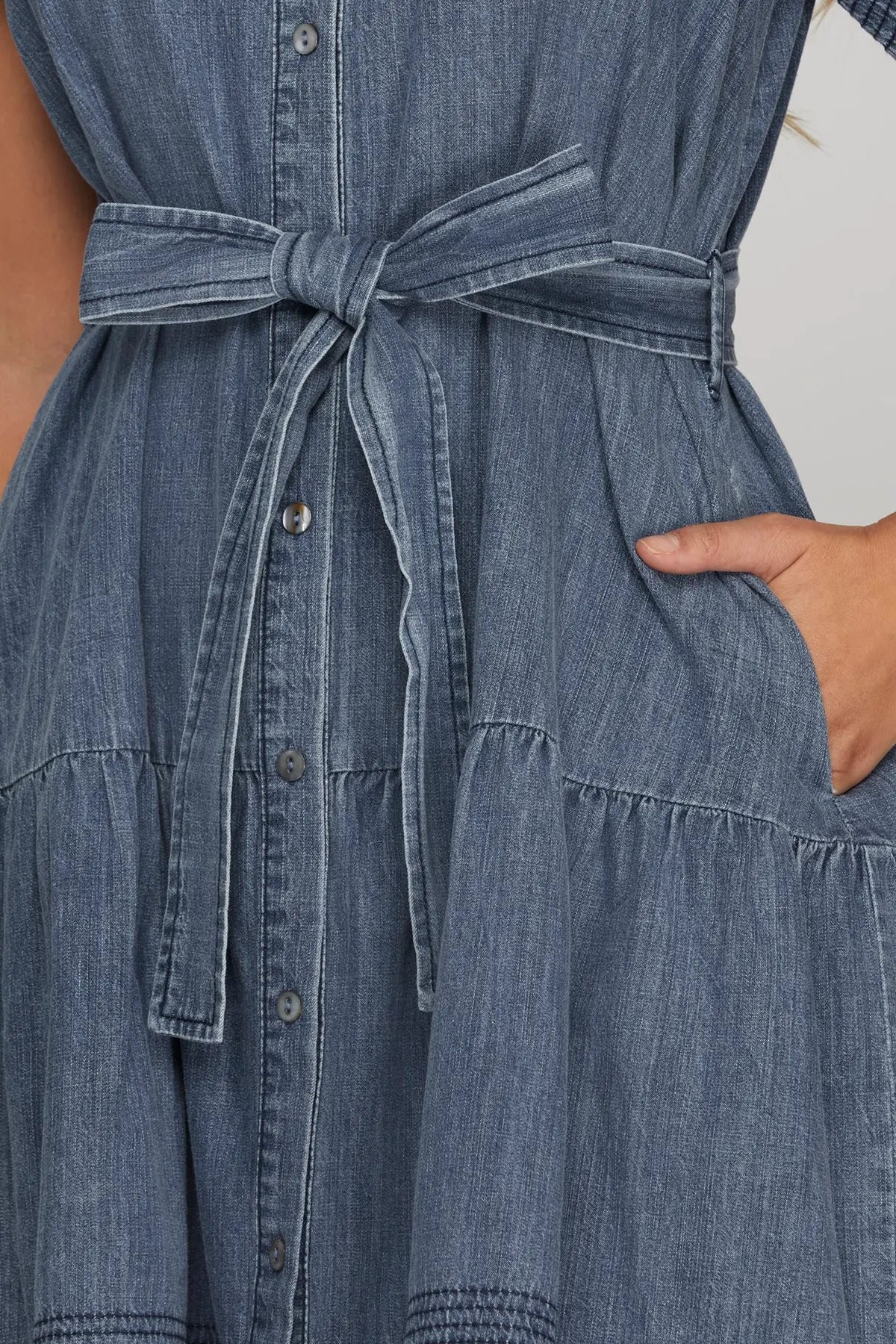 STITCHED FLOUNCE SLEEVE BUTTON DOWN WASHED DENIM DRESS WITH WAIST TIE AND POCKETS