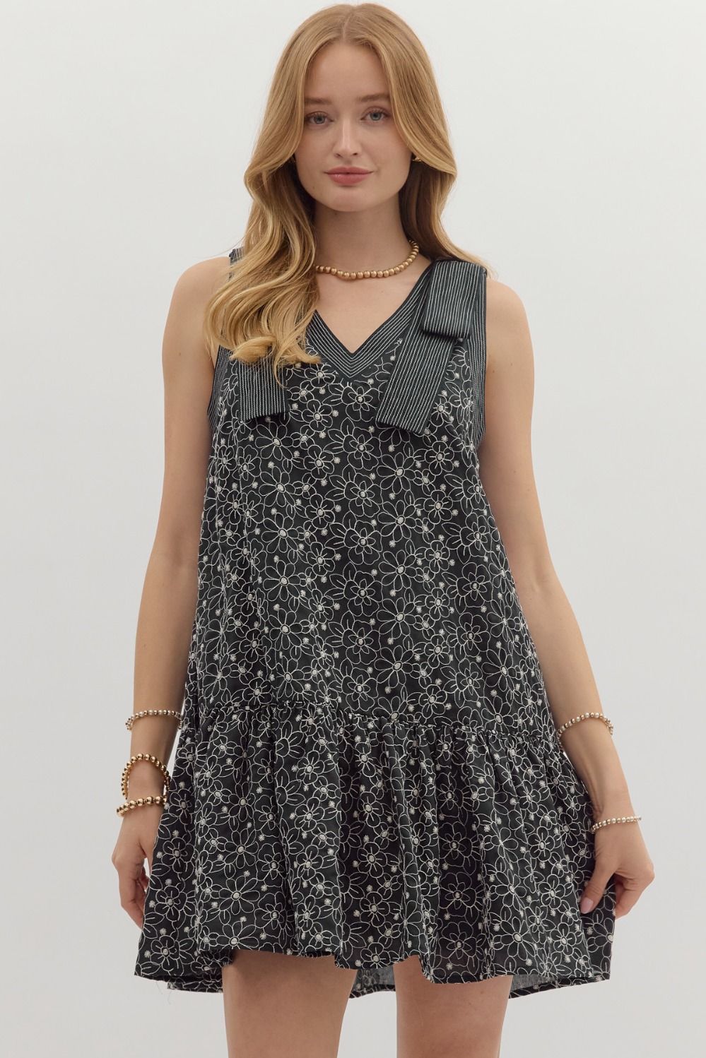 Floral embroidered sleeveless ruffle hem mini dress