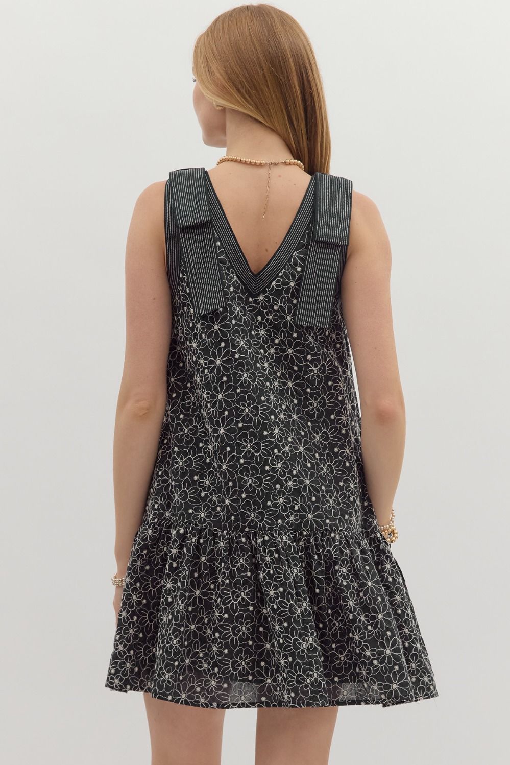 Floral embroidered sleeveless ruffle hem mini dress