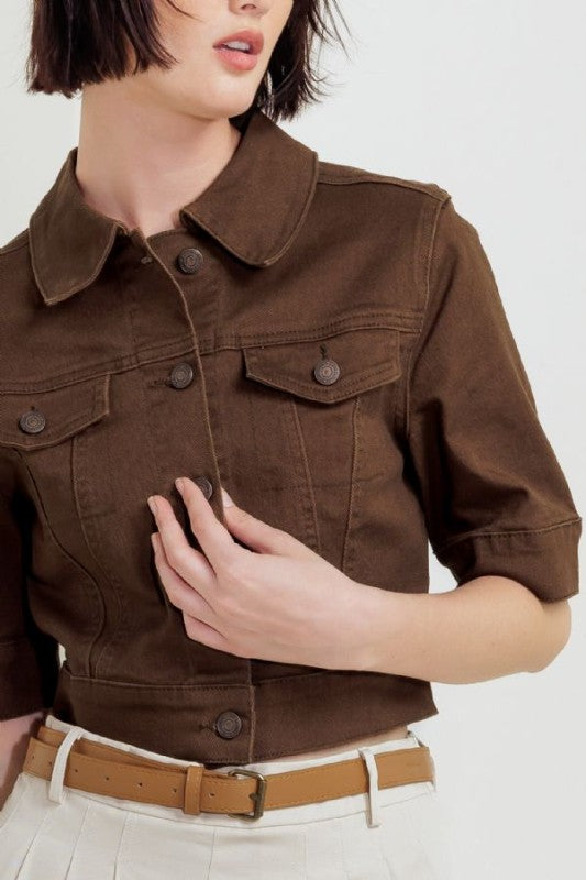 A washed twill jacket with short sleelve and front button closure