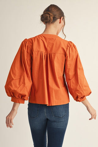 Eyelet Accent Peplum Top