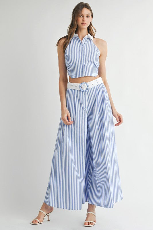 The wide-legged pants, designed with white and blue vertical stripes