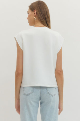 Solid cap sleeve crew neck pullover top. Unlined