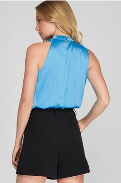 SLEEVELESS ASYMMETRICAL MOCK NECK WOVEN TOP