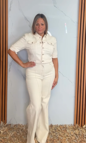 A twill pant featuring front closure, pockets, center seam and flare leg.