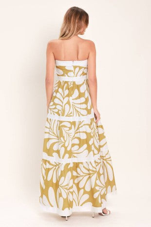 A printed woven maxi dress featuring strapless neckline, tier skirt and back zipper closure