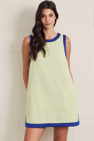 Textured sleeveless mini dress featuring contrast binding