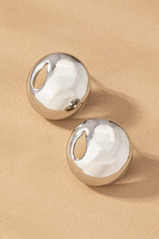 Stainless puffy button ear with cutout teardrop