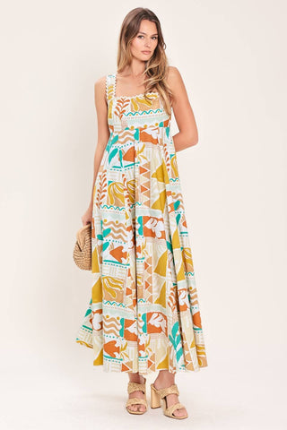 A printed woven midi dress featuring straight neckline with ric-rac ribbon trim, circle skirt and smocked back bodice