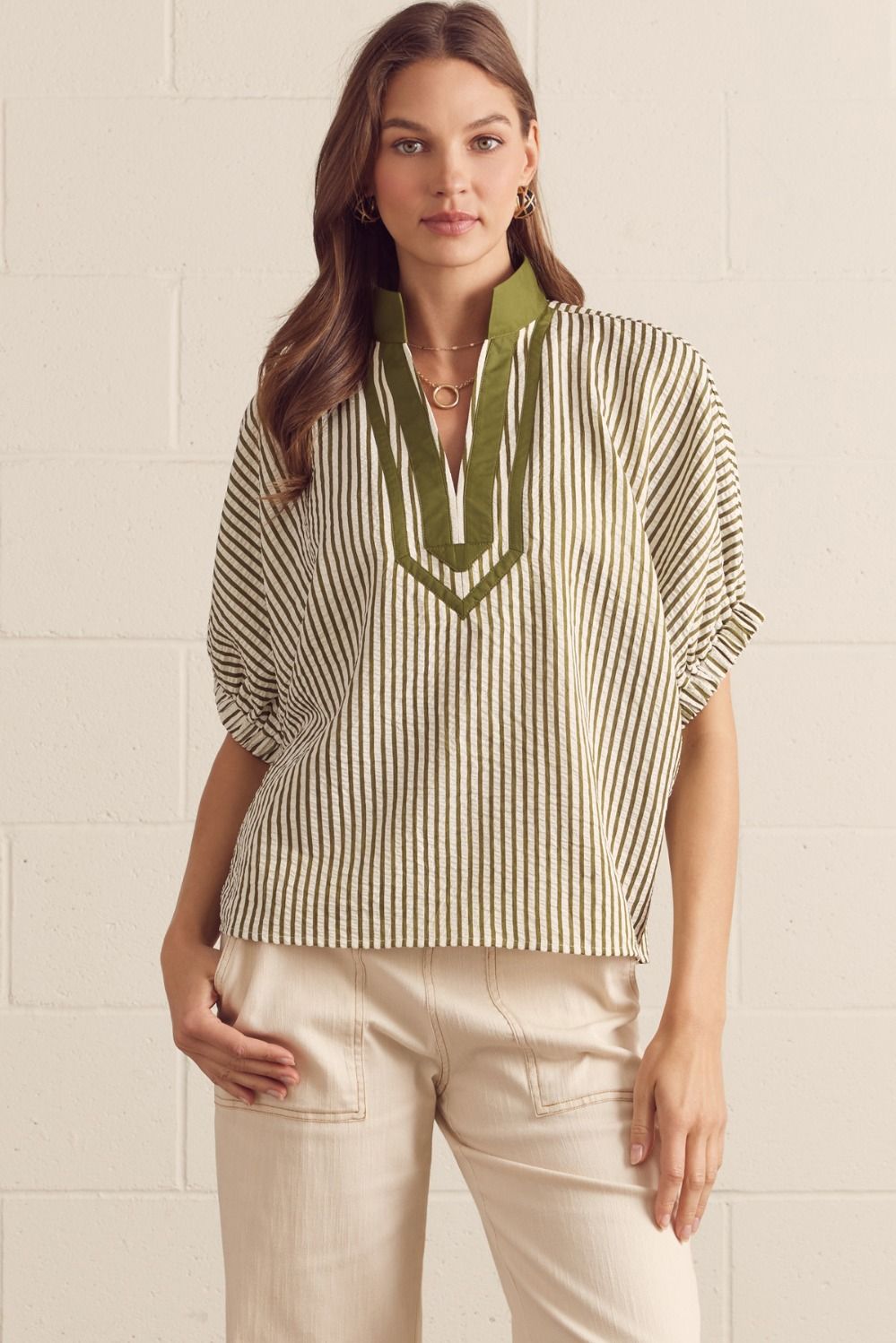 Striped split neck short dolman sleeve top.