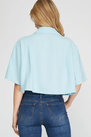 HALF SLEEVE WOVEN BUTTON DOWN CROP TOP WITH UTILITY POCKETS
