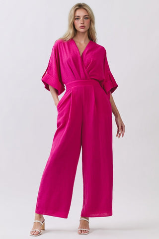 Step out in vibrant style with this stunning fuchsia jumpsuit