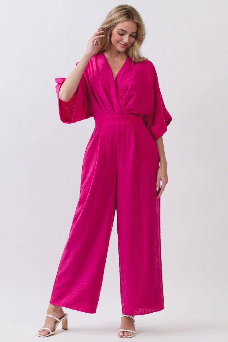 Step out in vibrant style with this stunning fuchsia jumpsuit