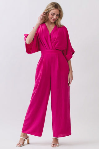 Step out in vibrant style with this stunning fuchsia jumpsuit