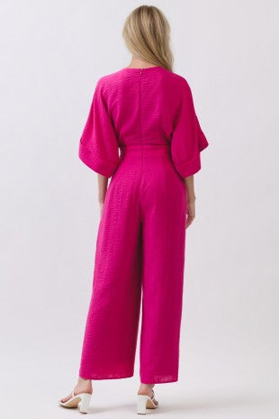 Step out in vibrant style with this stunning fuchsia jumpsuit