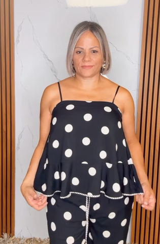 Polka dot sleeveless peplum top featuring square neckline