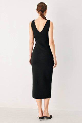 A sweater knit midi dress featuring V neckline and side cut out