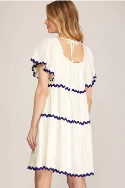 FLOUNCE SLEEVE WOVEN TIERED DRESS WITH CONTRAST SCALLOP TRIM AND BACK TIE