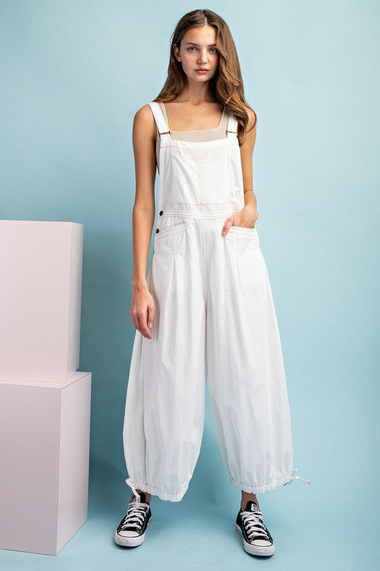 SLEEVELESS JUMPSUIT WITH POCKETS