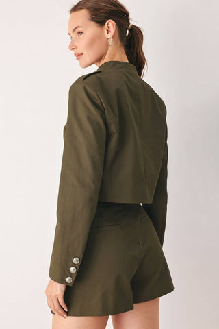 A solid woven crop jacket