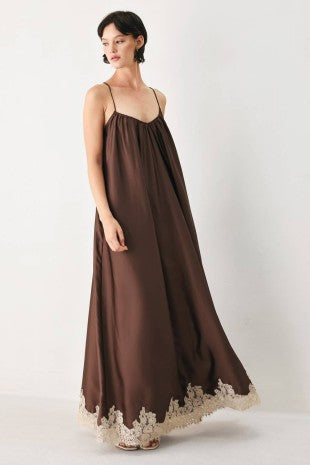 A solid woven midi slip dress with lace hem