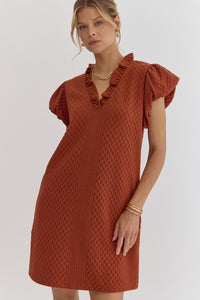 Textured short-sleeve v-neck mini dress featuring bubble sleeves.