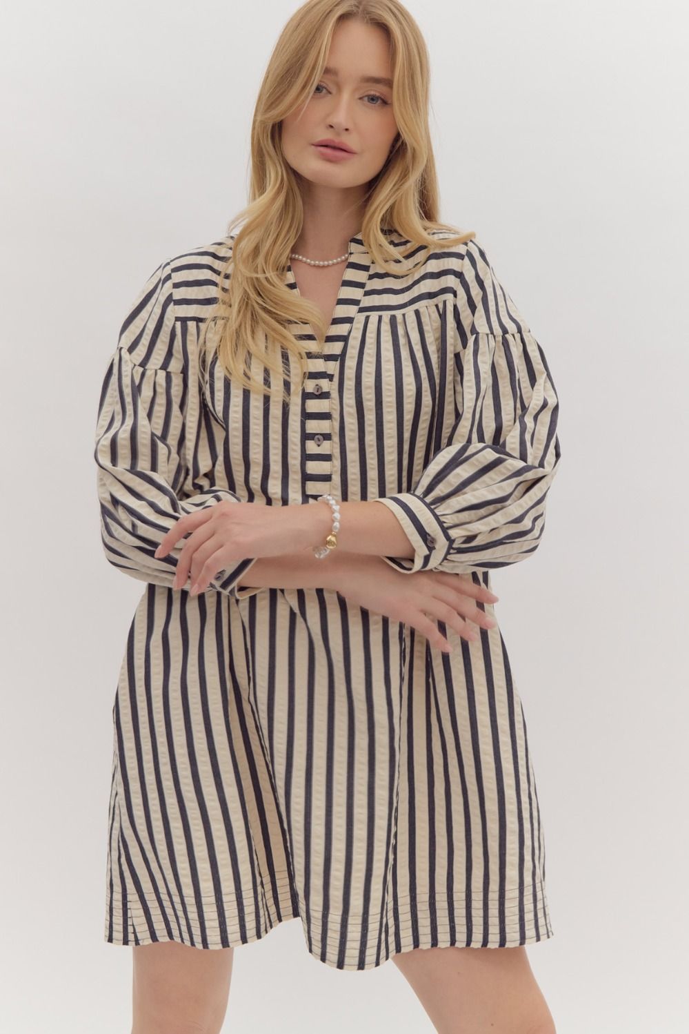 Stripe 3/4 sleeve drop shoulder mini dress featuring pockets at side