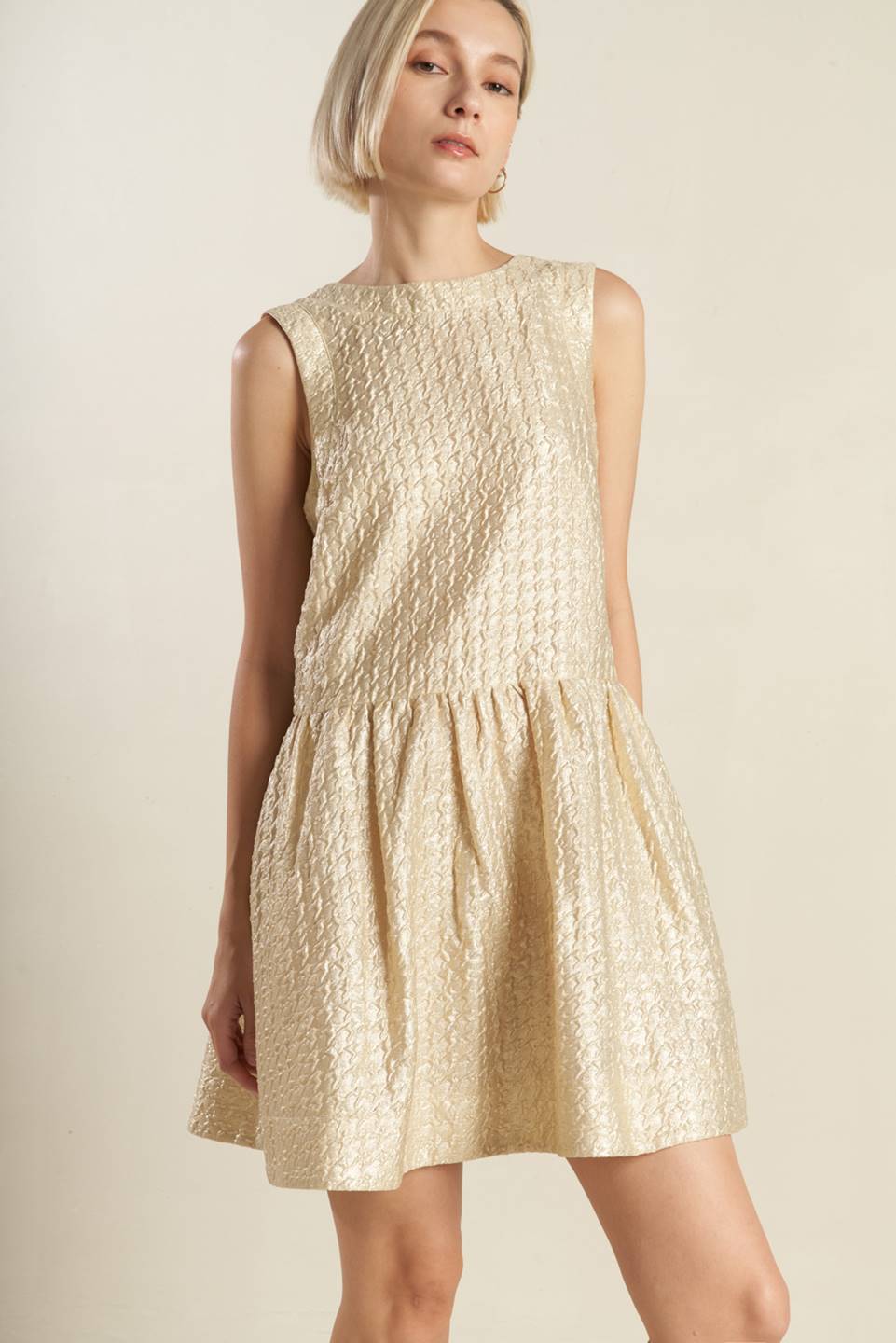 A textured woven mini dress