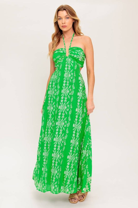 A printed woven maxi dress featuring halter neckline