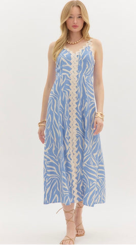 Abstract pattern slit hem oversized accented ricac trimmed midi dress