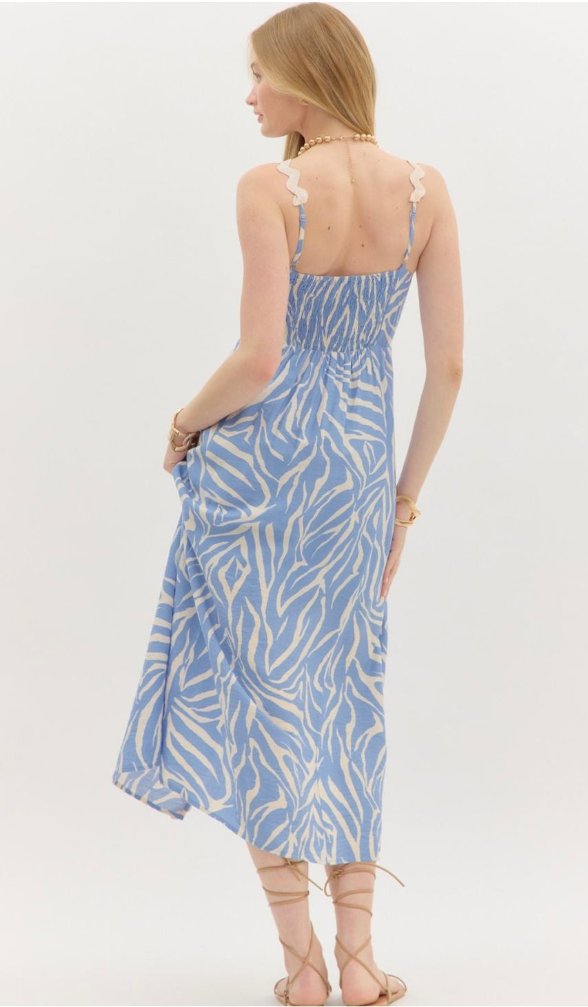 Abstract pattern slit hem oversized accented ricac trimmed midi dress