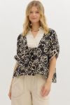 Solid cuff band ¾ sleeve pullover top featuring contrast collar V-neck