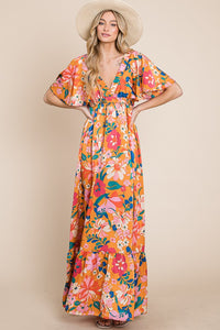 a satin floral woven short sleeve deep v neck maxi dress
